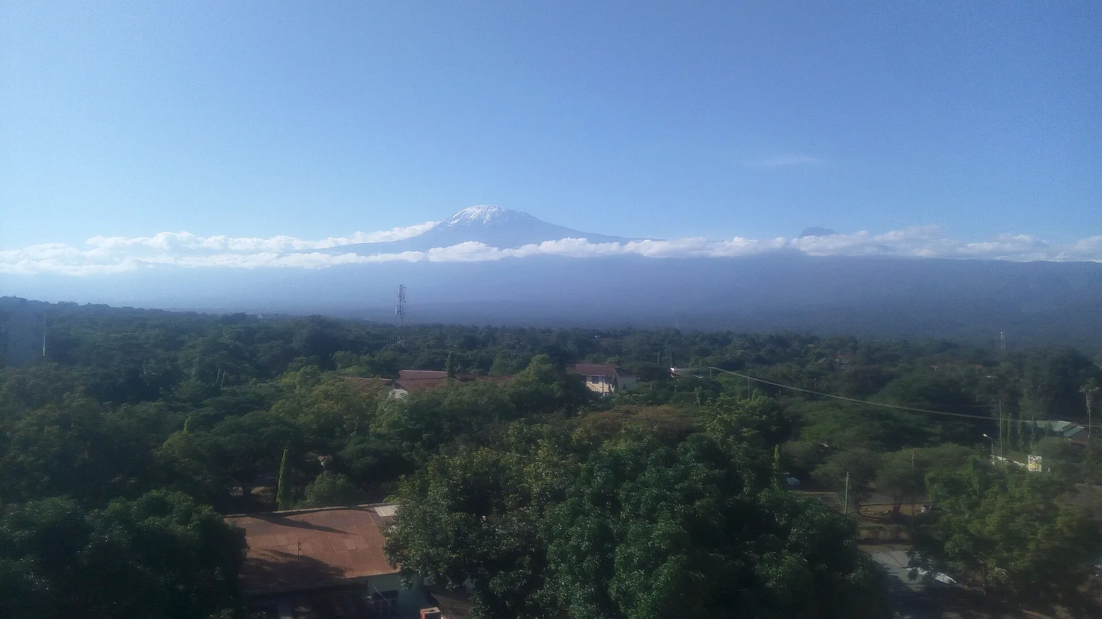 Mount Kilimanjaro seen above clouds from Moshi, Tanzania